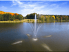 Autumn lake view featuring the Scott Aerator Clover fountain spray pattern