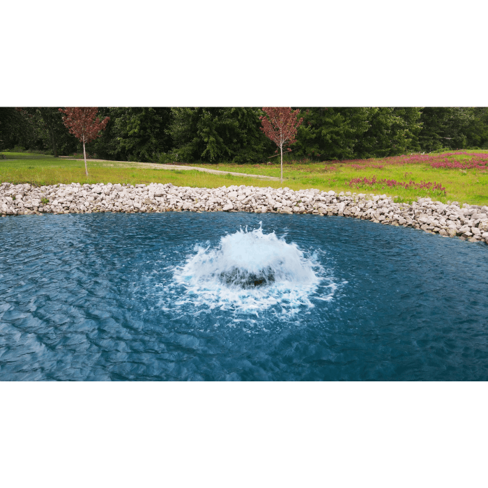 Boilermaker Pond Aerator by Scott Aerator circulating water in a landscaped retention pond