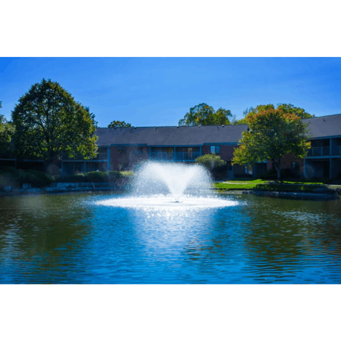 Brand Scott Aerator DA-20 display aerator operating in apartment community retention pond