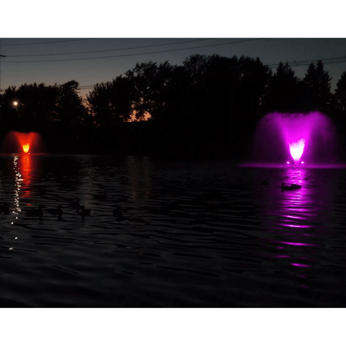 DA-20 Scott Aerator pond fountain illuminated with optional LED lighting during nighttime operation
