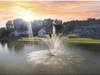 Scott Aerator Amherst Pond Fountain creating a decorative spray pattern in a neighborhood pond