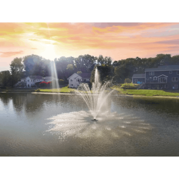 Scott Aerator Amherst Pond Fountain creating a decorative spray pattern in a neighborhood pond