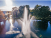 Scott Aerator Atriarch fountain captured from above with bright sunlight and wide spray pattern