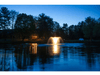 Scott Aerator DA-20 display aerator illuminated at dusk on residential pond