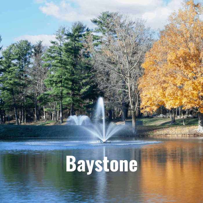 Scott Aerator Great Lakes Fountain with Baystone spray pattern installed in pond