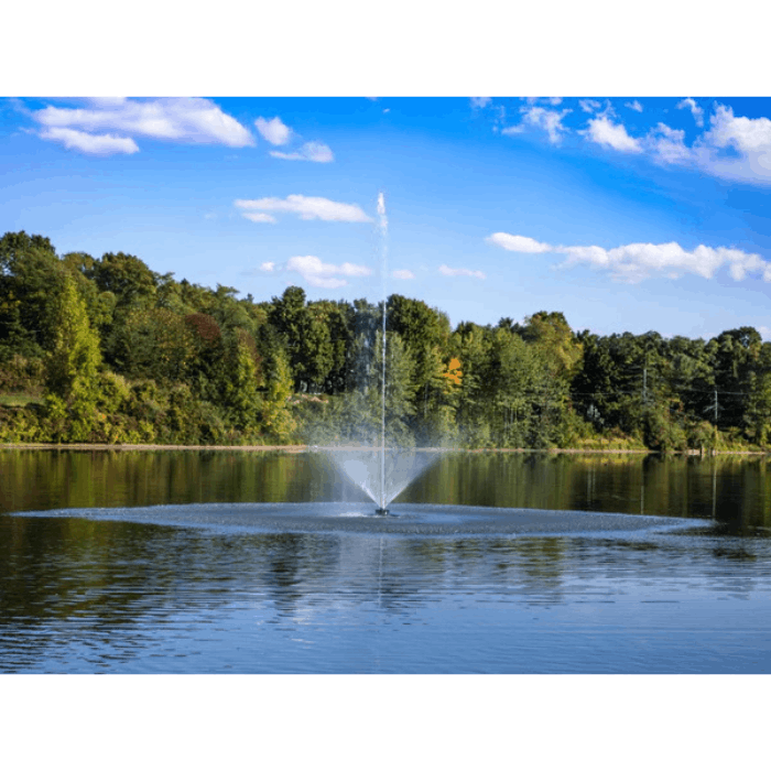 Scott Aerator Skyward fountain creating a tall center plume on a bright blue-sky day