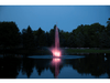Scott Aerator Skyward fountain glowing pink at dusk on a calm pond