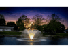 Scott Aerator white LED light set for fountains installed on illuminated pond fountain at sunset