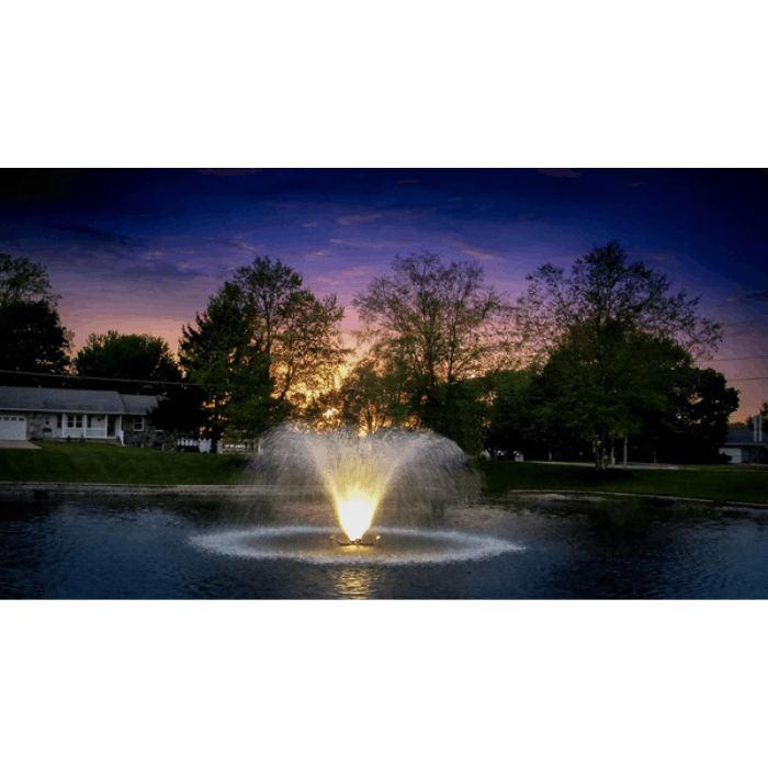 Scott Aerator white LED light set for fountains installed on illuminated pond fountain at sunset