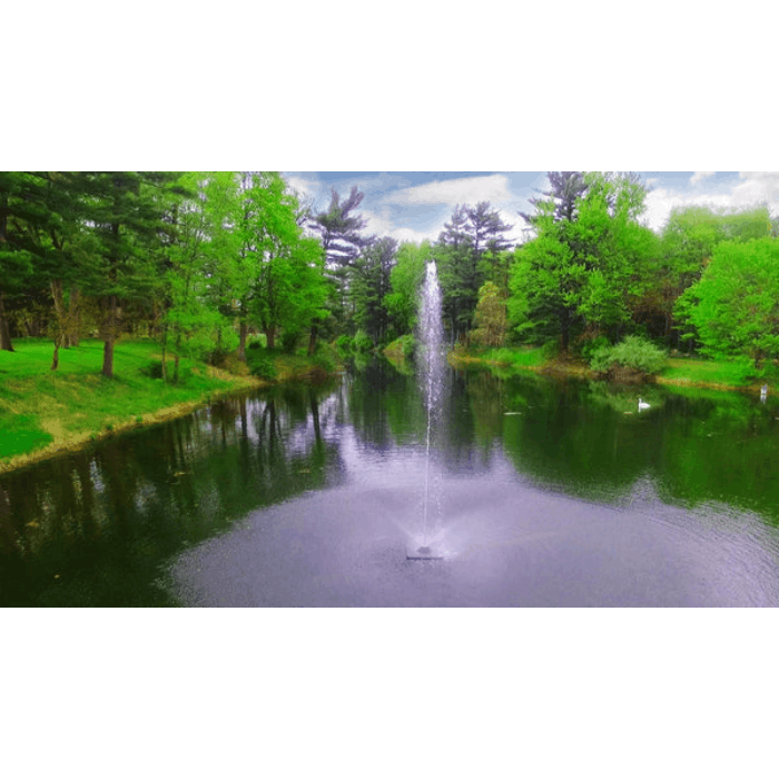 Skyward Pond Fountain by Scott Aerator in a narrow tree-lined pond with vivid green banks