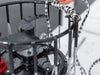 Close-up of Kasco De-Icer showing protective cage housing and power cord connection during winter use