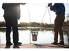 Kasco De-Icer Unit on Sling Holding By Two Men