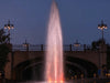 Kasco J Series Fountain spraying in front of a stone bridge