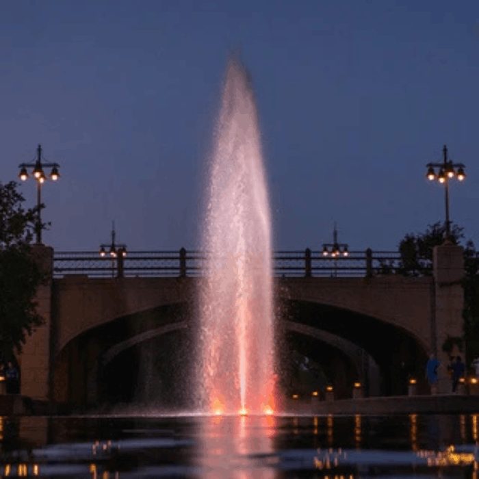 Kasco J Series Fountain spraying in front of a stone bridge