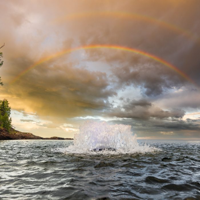 Kasco Surface Aerator Aerating on Water with Beautiful Rainbow at the Background