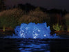 Kasco with blue LED lighting illuminating pond water at night
