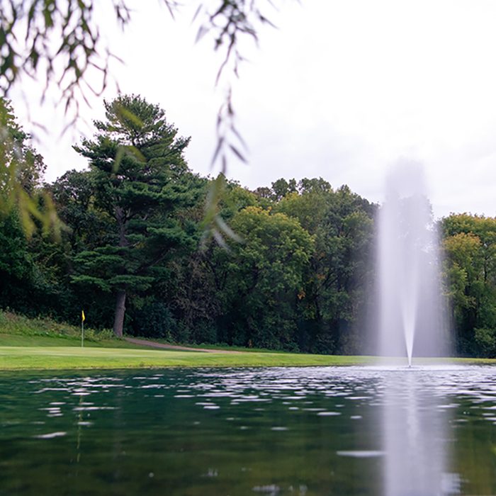 J Series fountain marketing lifestyle shot (pond and shoreline)
