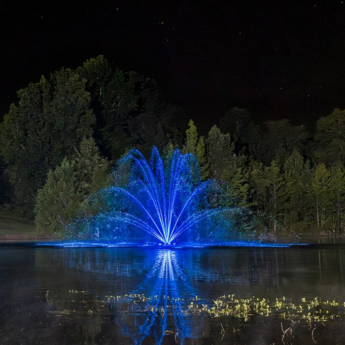 Kasco J Series fountain with RGBW lit spray pattern (lifestyle 3)