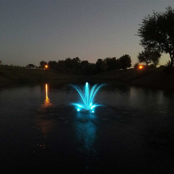 PondSelect Classic Series 1/3 HP Pond Fountain - Palm spray pattern with LED lights at night
