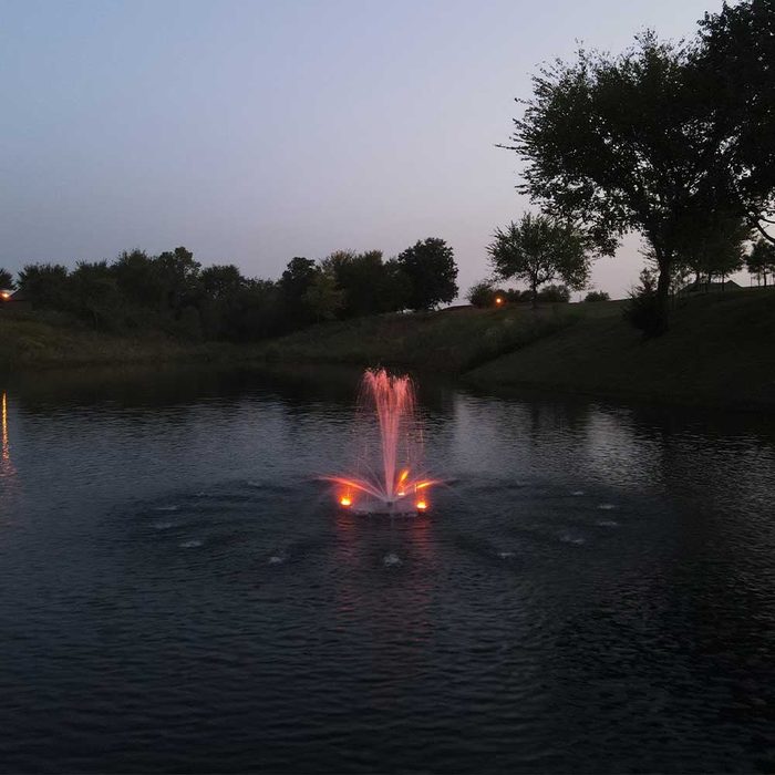 PondSelect Classic Series 1/3 HP Pond Fountain - Trumpet Jet spray pattern with LED lights at night