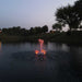 PondSelect Classic Series 1/3 HP Pond Fountain - Trumpet Jet spray pattern with LED lights at night