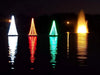 Floating Christmas Tree White, Red, and Green LED trees with fountain next to them