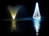 Floating Christmas Tree with White LED lights next to fountain