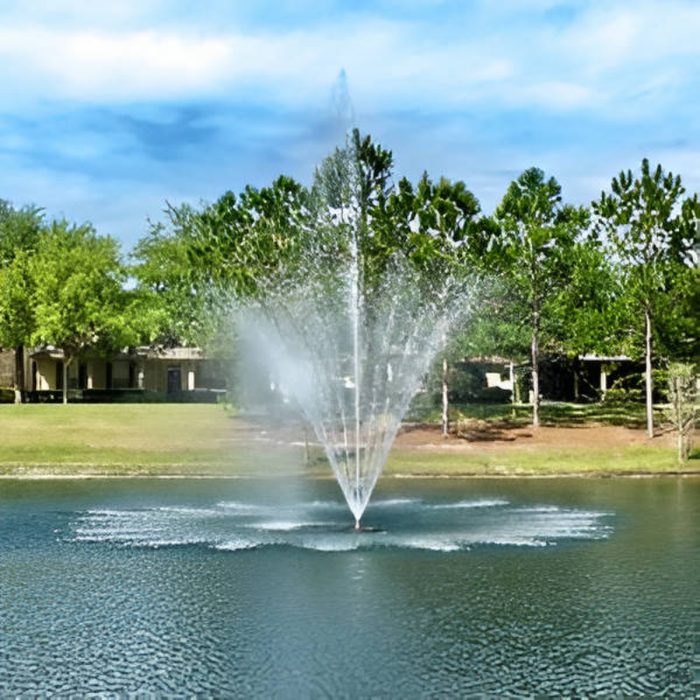 Vertex TwoTier Floating Fountain Series On Warter with Trees at the Background