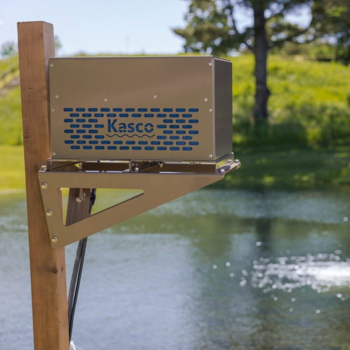 Robust-Aire Small Cabinet with Post Mount Bracket on a wooden stand by a pond