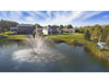 Scott Aerator Solar Amherst Fountain in a residential pond