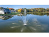 Scott Aerator Solar Atriarch Fountain in a fishing lake with houses in the background