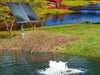 Scott Aerator Solar Boilermaker 1/2 HP with two solar panels beside the pond