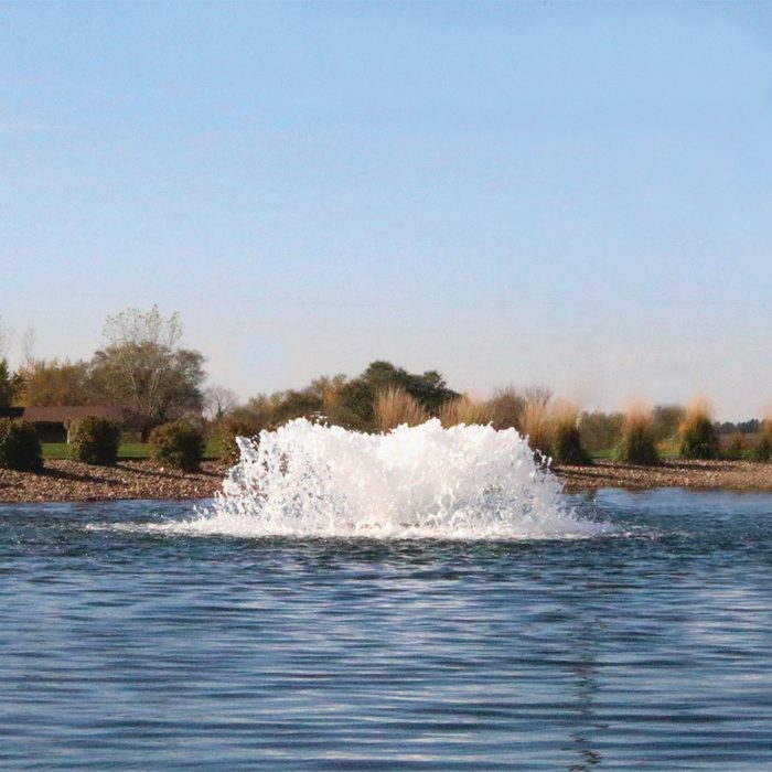 Surface Aerator On Blue Water Aerating