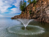 VFX Series fountain spraying on the water under a cloudy sky